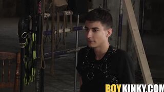 Restrained sub Axel Rubberax spanked and tickled by dom