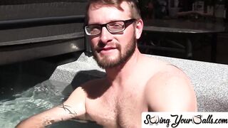 Gay with glasses shows balls prior to stroking off with pal