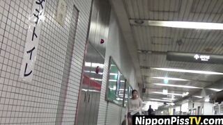 Unusual Asian brunettes pissing all around their bushy pussies