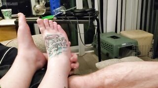 Hubby rubbing my lotion on my toes