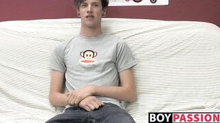 Adorable gay guy Danny jerks off his dick on couch solo