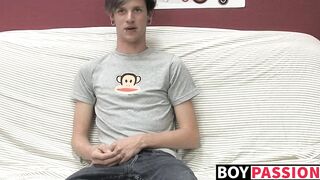Adorable gay guy Danny jerks off his dick on couch solo