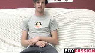 Adorable gay guy Danny jerks off his dick on couch solo