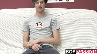 Adorable gay guy Danny jerks off his dick on couch solo