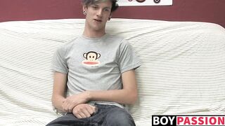 Adorable gay guy Danny jerks off his dick on couch solo