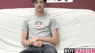 Adorable gay guy Danny jerks off his dick on couch solo