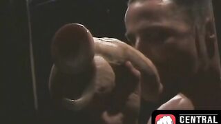 CentralFisting.com - Muscular gay worships a massive dildo before a wild ride