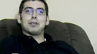 Nerdy amateur with glasses strips to jerk off until he cums