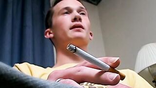 Hottie Braden Spence smokes reds while jerking and end it with a massive load of cum