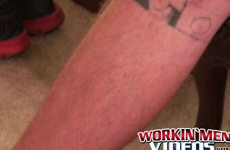 Bearded tattooed mature guy jerks off and cums on himself