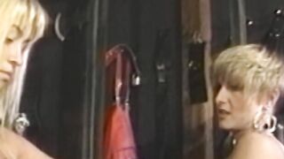 Busty lesbian gets submissive for a spanking by a femdom