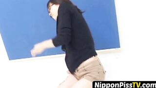 Cute Japanese pissing her undies and fills the cup