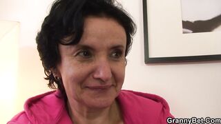 A slim mature woman fucks with a young dude