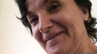 A slim mature woman fucks with a young dude