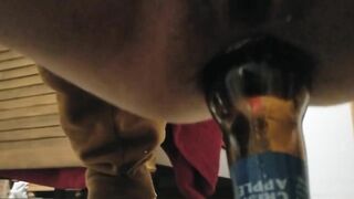 Unshaved cunt takes bottle inside booty