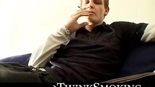 Bad stud Tomy chainsmoke his red cig while jerking on the couch