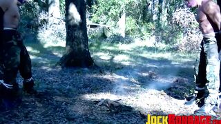 Captive soldier Duke Rivers and Tyler Saint in a rough tormenting play