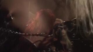Redhead domina disciplines lesbian sub with mega dildo
