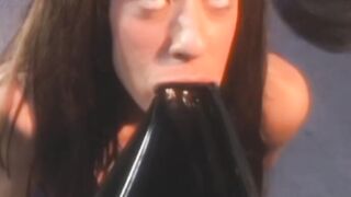 Lesbian babe submits her pussy to latex dominatrix