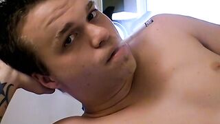 Tattooed Holden pullout cock and shoots load on his chest while blowing smoke