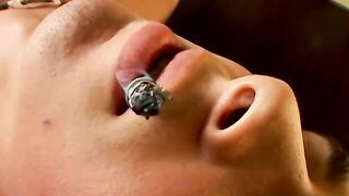 This hot smooth country jock chainsmokes while stroking and using a buttplug