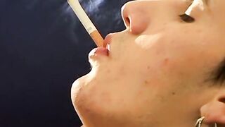 Hung Antony puffs his cigarette while stroking his big dick