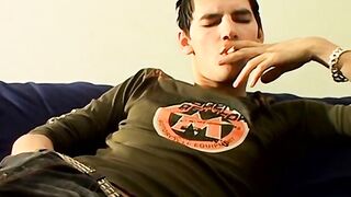 Hung Antony puffs his cigarette while stroking his big dick