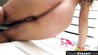 TransSteamy.com - Brunette shemale Paulinha strokes her dick poolside in a steamy sol