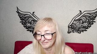 Blonde amateur MILF IngritSno with glasses on webcam