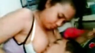 Busty Asian Babe Gives Sensual Blowjob and Titillates with Massive Boobs