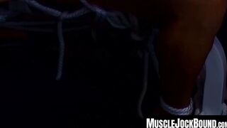 MuscleJockBound.com - Inked man in uniform struggles to free himself from tight ropes