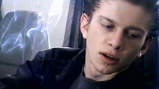Attractive Ian Madrox is blowing smoke and starts stretching his cock in his smoky je