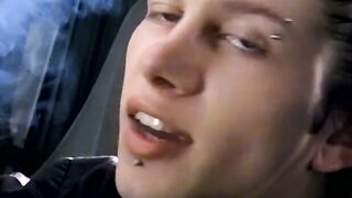 Attractive Ian Madrox is blowing smoke and starts stretching his cock in his smoky je