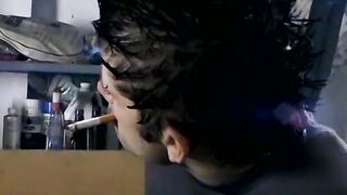 Attractive Ian Madrox is blowing smoke and starts stretching his cock in his smoky je