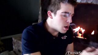 Sexy Austin smokes two at once before stroking his cock