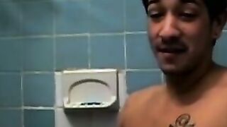 Amateur tattooed twink with a tan showers in classics porn