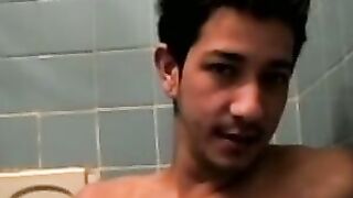 Amateur tattooed twink with a tan showers in classics porn