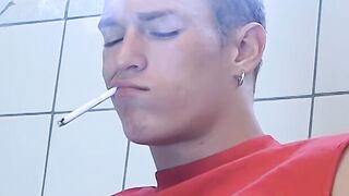 Attractive Yuri fires up his cig and sits on the toilet for his hot smokin and stroki
