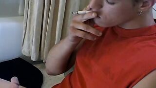 Attractive Yuri fires up his cig and sits on the toilet for his hot smokin and stroki