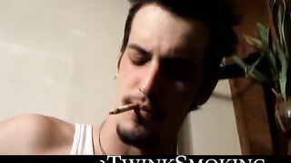 Straight rocker Axel plays his guitar and his throbbing cock with his pack of cigaret