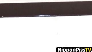NipponPissTV.com - Young Japanese takes her panties off to pee in a coffee shop publi