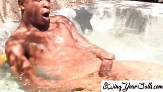 SwingYourBalls.com - Gay jock tugs his thick black cock and balls solo in the pool