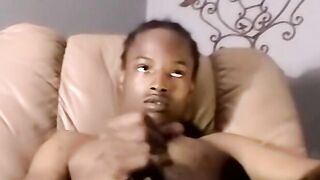 Black amateur strokes his dick before his lover eats his cum