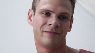 Young skinny gay tugs his big cock while anally fucked