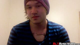 Tattooed punk jock jerking off his big throbbing cock solo