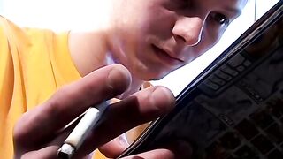 Smoking and uncut cock  stroking by young Stone Solo session
