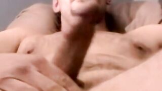 Amateur guy strokes his cock to porn while recorded with cam