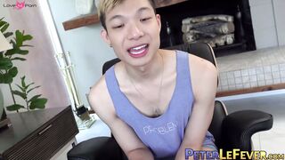 Sweet looking twink Kai Cho tugs his meaty bulge and cums all over himself