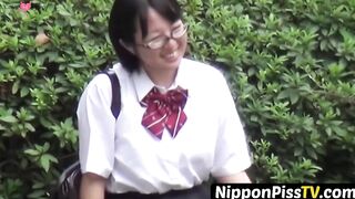 NipponPissTV.com - Naughty Japanese schoolgirl pissing in a public building openly