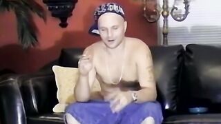 Solo amateur toys with his throbbing cock and cums